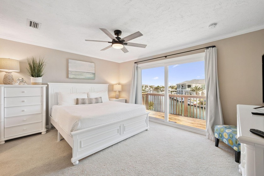 Nestled along the serene canals of Holiday Isle, this stunning - Beach Townhome/Townhouse for sale in Destin, Florida on Beachhouse.com