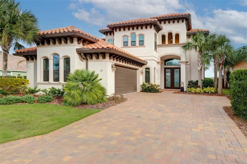 Welcome to this beautifully maintained custom home, built in - Beach Home for sale in Palm Coast, Florida on Beachhouse.com