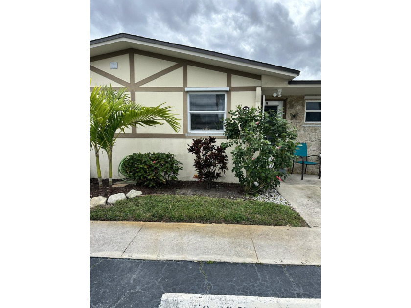Welcome into the one -level Corner unit in a 55+Community,2/2 - Beach Home for sale in West Palm Beach, Florida on Beachhouse.com