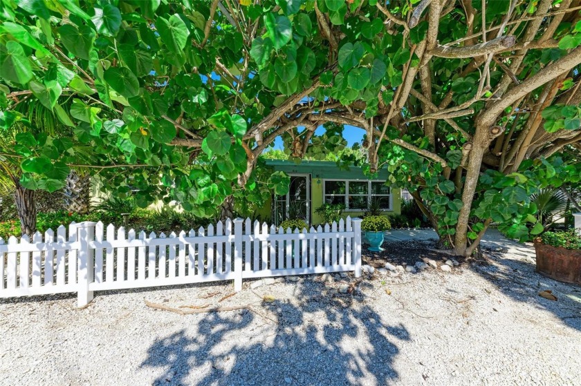Snuggled beneath a canopy of sea grape trees and enveloped by a - Beach Home for sale in Anna Maria, Florida on Beachhouse.com