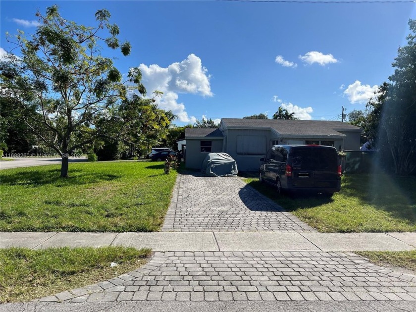 This fantastic home is on an 8,622-square-foot corner lot in a - Beach Home for sale in North Miami Beach, Florida on Beachhouse.com