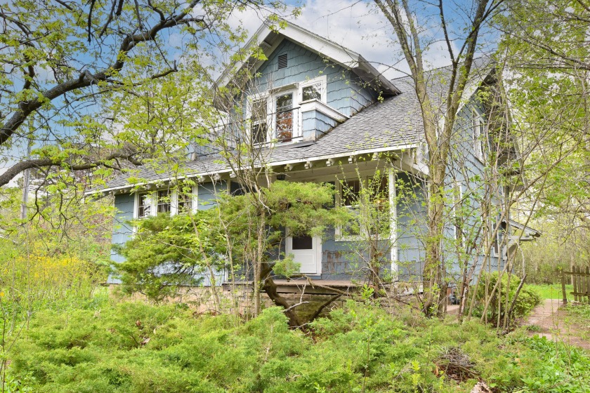 Charming & character 5 bedroom home down a private driveway in - Beach Home for sale in Bayside, Wisconsin on Beachhouse.com