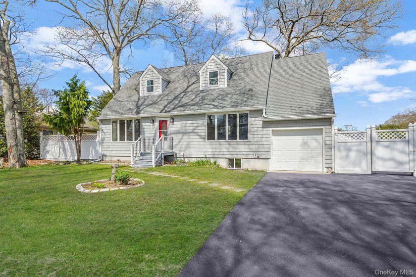 Welcome to this beautifully renovated oversized expanded Cape in - Beach Home for sale in Patchogue, New York on Beachhouse.com