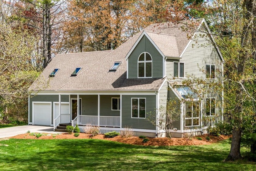 Clean lines, a warm covered front porch, and a dramatic arched - Beach Home for sale in Dover, New Hampshire on Beachhouse.com