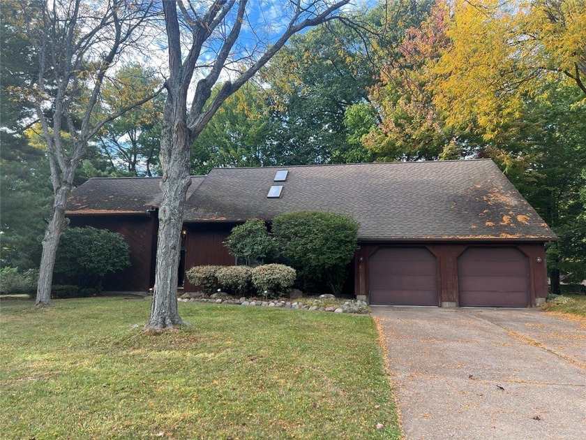 Nestled in desirable Millcreek, this contemporary home is the - Beach Home for sale in Erie, Pennsylvania on Beachhouse.com