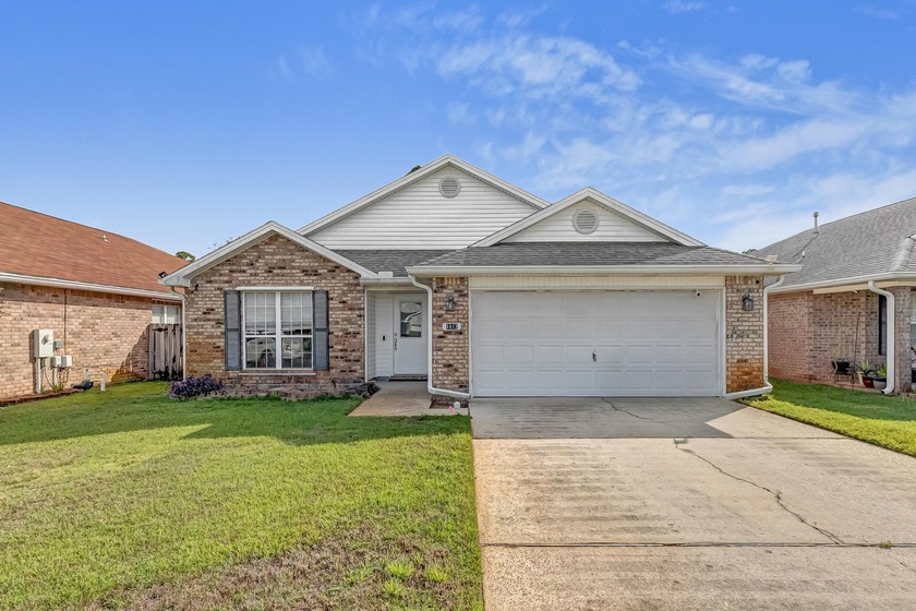 Located just minutes from the back gate of Hurlburt Field in one - Beach Home for sale in Fort Walton Beach, Florida on Beachhouse.com