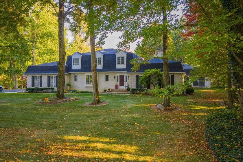 This timeless French Colonial-style home, beautifully finished - Beach Home for sale in Erie, Pennsylvania on Beachhouse.com