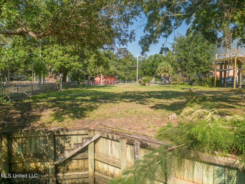 This prime waterfront lot offers direct access to the Jordan - Beach Lot for sale in Bay Saint Louis, Mississippi on Beachhouse.com