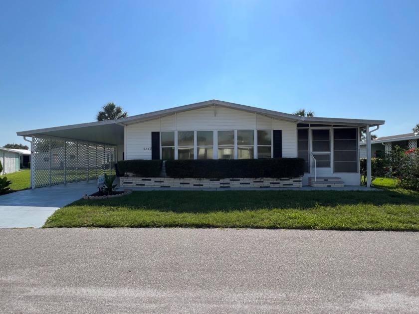 THIS HOME IS ON LEASED LAND WITH AN APPROXIMATE MONTHLY LOT - Beach Home for sale in Sarasota, Florida on Beachhouse.com