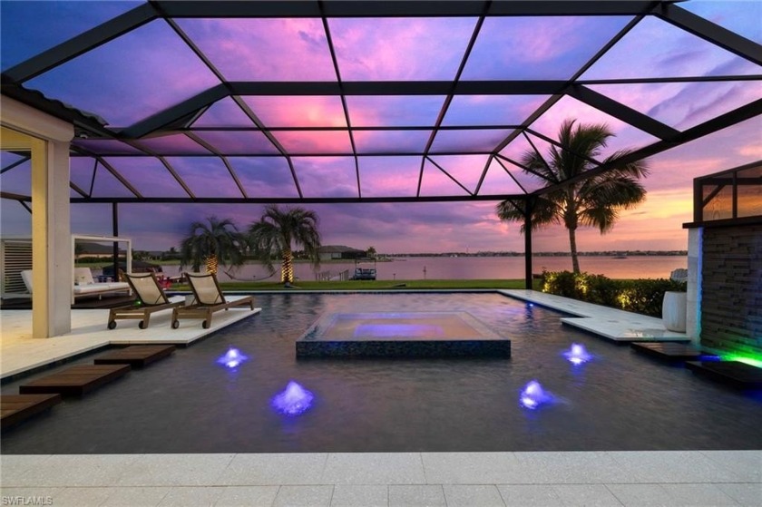 Presenting an extraordinary lakefront estate in the exclusive - Beach Home for sale in Fort Myers, Florida on Beachhouse.com