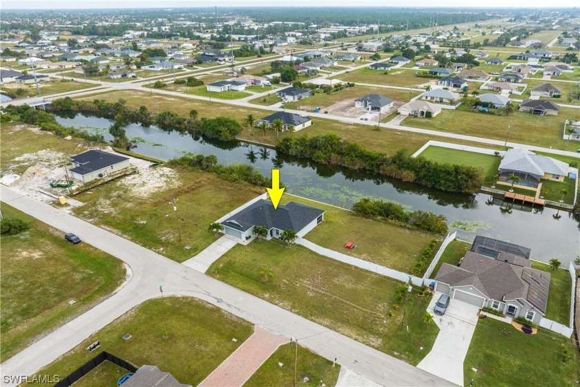 Discover this updated WATERFRONT home on nearly HALF AN ACRE - Beach Home for sale in Cape Coral, Florida on Beachhouse.com