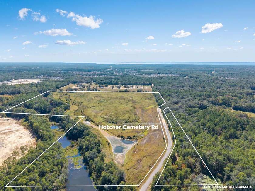 Explore the potential of this expansive 40-acre parcel, offering - Beach Acreage for sale in Freeport, Florida on Beachhouse.com