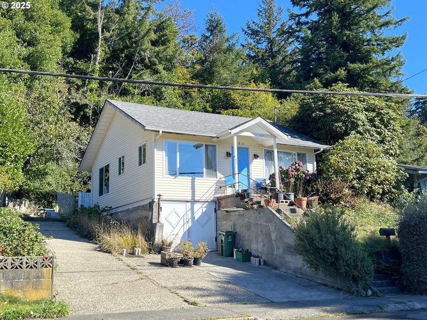 Step into timeless charm with this 2-bedroom, 1-bath home - Beach Home for sale in Coos Bay, Oregon on Beachhouse.com