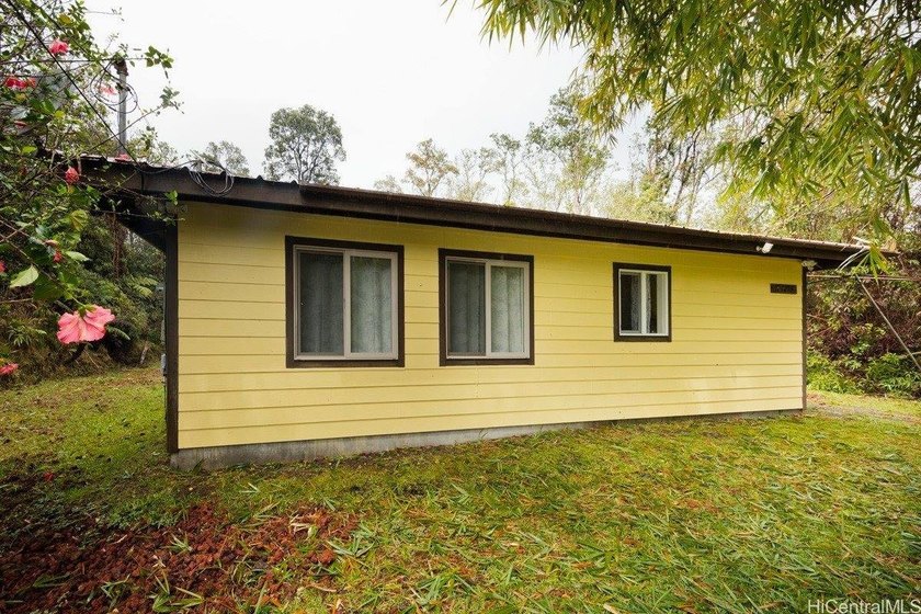 Cottage-style home on approximately  1/4  acre in a forested - Beach Home for sale in Volcano, Hawaii on Beachhouse.com