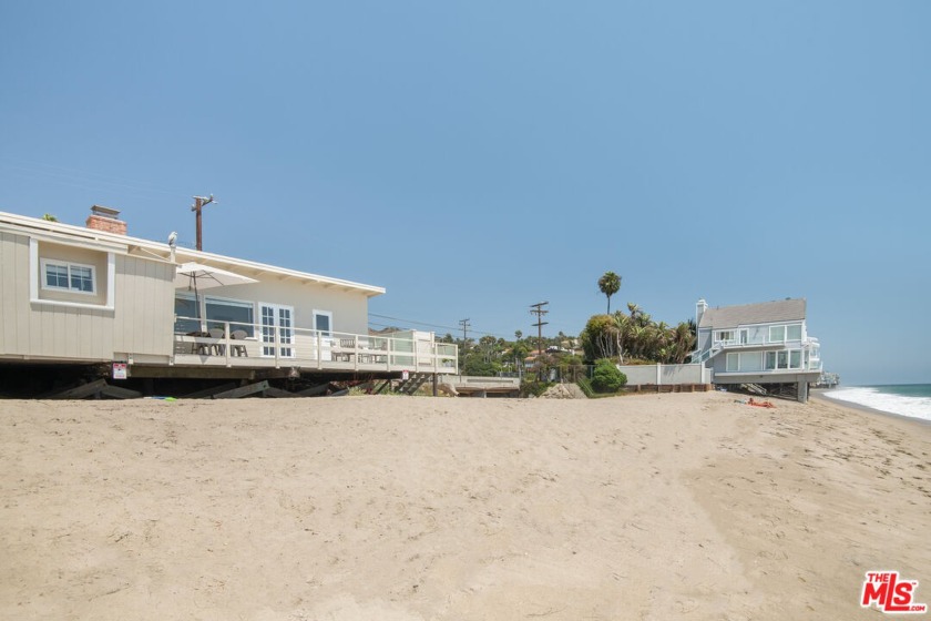 Perfectly situated sun-drenched corner beach house with approx - Beach Home for sale in Malibu, California on Beachhouse.com