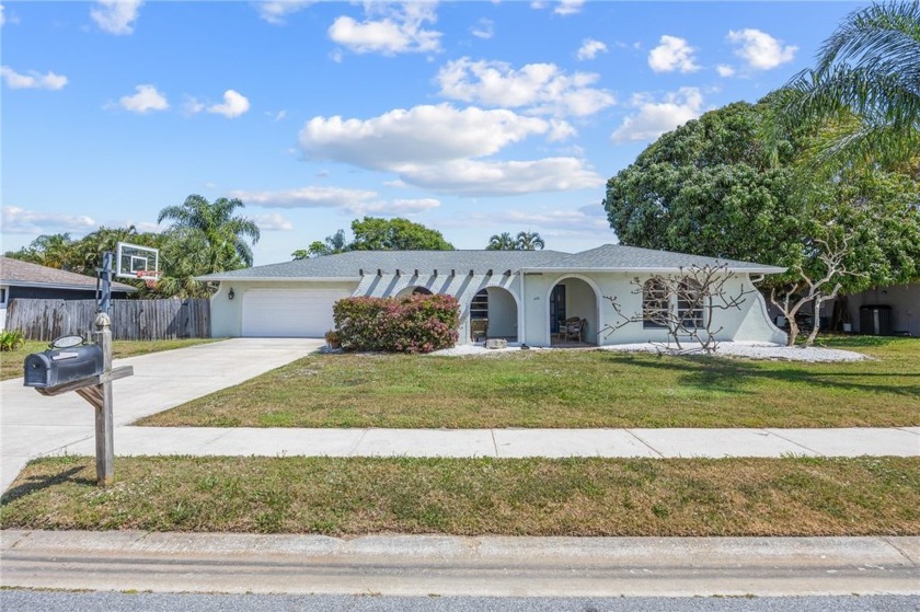 Beautifully maintained home is nestled between the Atlantic - Beach Home for sale in Indialantic, Florida on Beachhouse.com