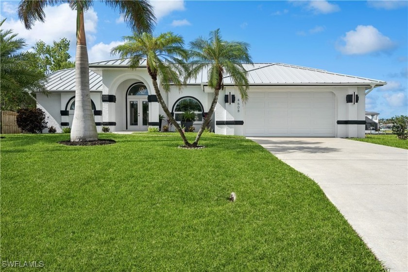 This Amazing 200+ foot wide canal in Southwest Cape, 3 bedroom 2 - Beach Home for sale in Cape Coral, Florida on Beachhouse.com