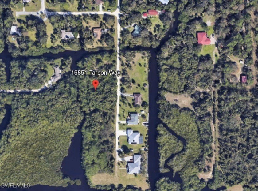 Nestled in the serene neighborhood of North Fort Myers, this - Beach Lot for sale in North Fort Myers, Florida on Beachhouse.com