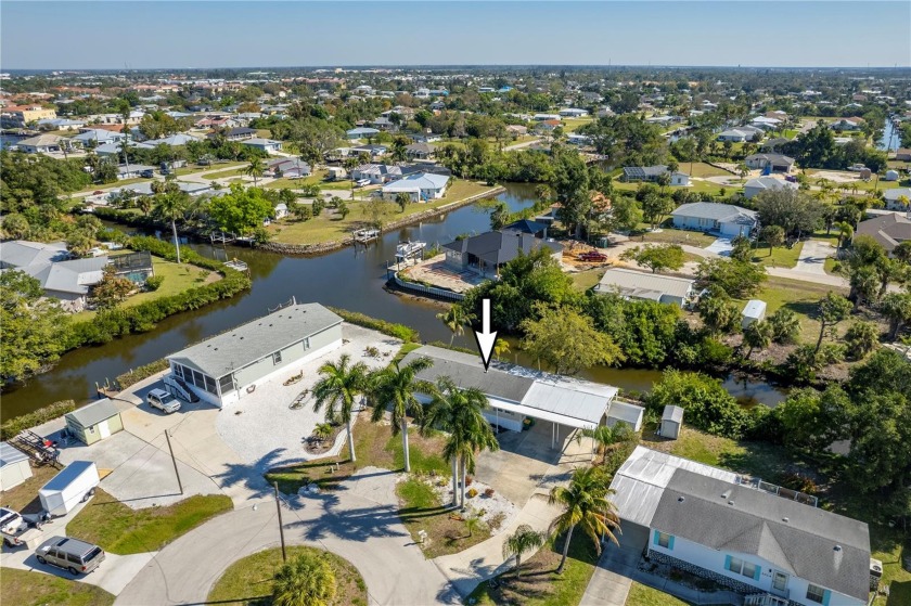 WATERFRONT MOBILE HOME LOCATED OFF OF AQUI ESTA IN BEAUTIFUL - Beach Home for sale in Punta Gorda, Florida on Beachhouse.com