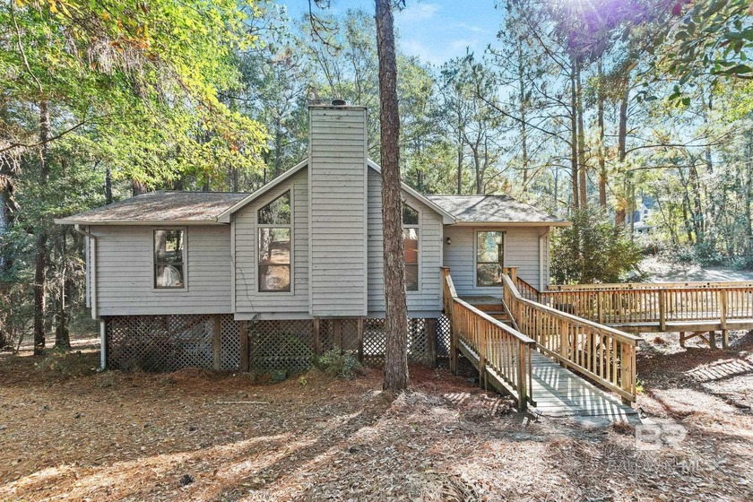 Looking for a home that feels like a cozy retreat tucked away in - Beach Home for sale in Daphne, Alabama on Beachhouse.com