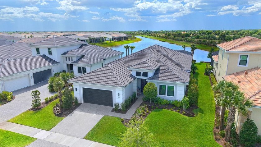 Sunsets stretch wide across the water in this newly constructed - Beach Home for sale in Sarasota, Florida on Beachhouse.com