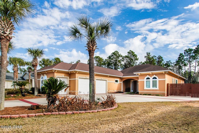 Custom Mediterranean style house features 10' to 12' ceilings - Beach Home for sale in Panama City Beach, Florida on Beachhouse.com