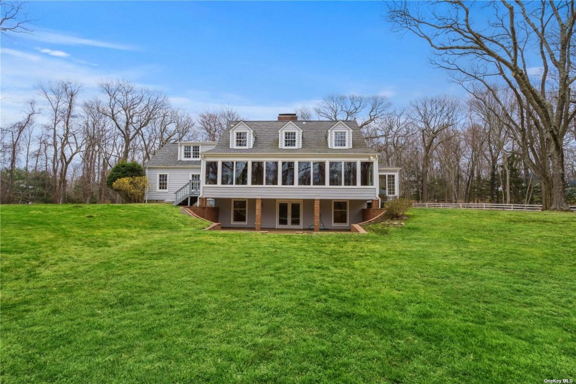 This 5 Bed, 4.5 Bath Estate w/walking trail to Flax Pond sits - Beach Home for sale in Old Field, New York on Beachhouse.com