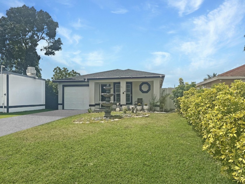 Beautiful and move-in ready property with great rental - Beach Home for sale in Palm Springs, Florida on Beachhouse.com