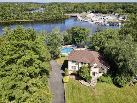 Welcome to this serene riverfront haven located on a private and - Beach Home for sale in Mays Landing, New Jersey on Beachhouse.com