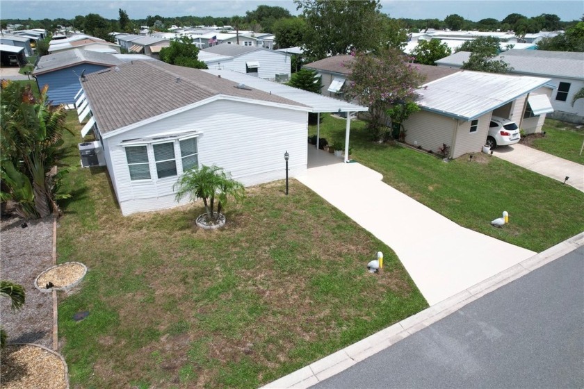 Welcome to this well-maintained, furnished home featuring solid - Beach Home for sale in Barefoot Bay, Florida on Beachhouse.com