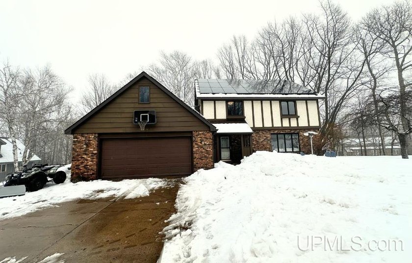Nestled in one of Marquette's most desirable neighborhoods, this - Beach Home for sale in Marquette, Michigan on Beachhouse.com