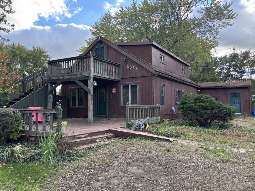 Opportunity knocks... bring your creativity and unlock the - Beach Home for sale in Erie, Pennsylvania on Beachhouse.com