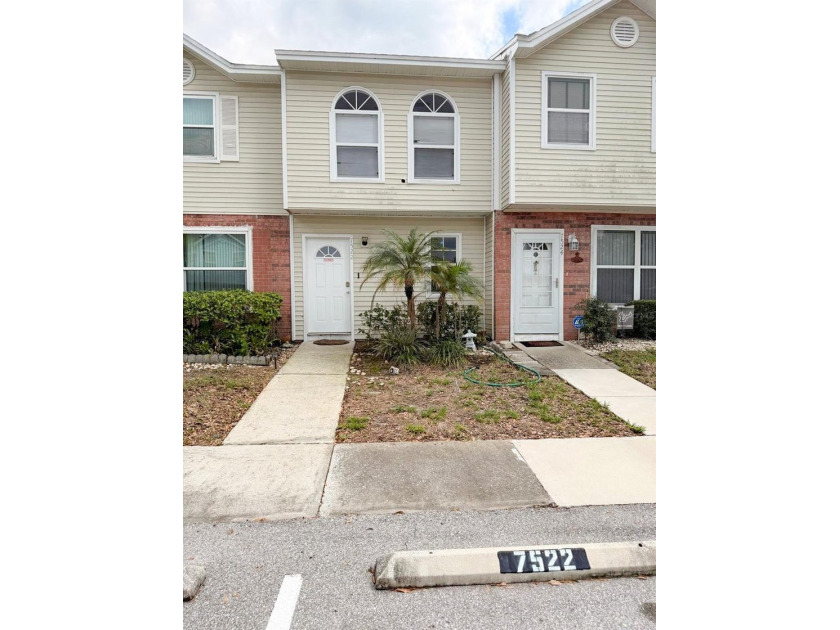 This move-in-ready townhome at 7522 Hollowell Dr, Tampa, FL - Beach Townhome/Townhouse for sale in Tampa, Florida on Beachhouse.com