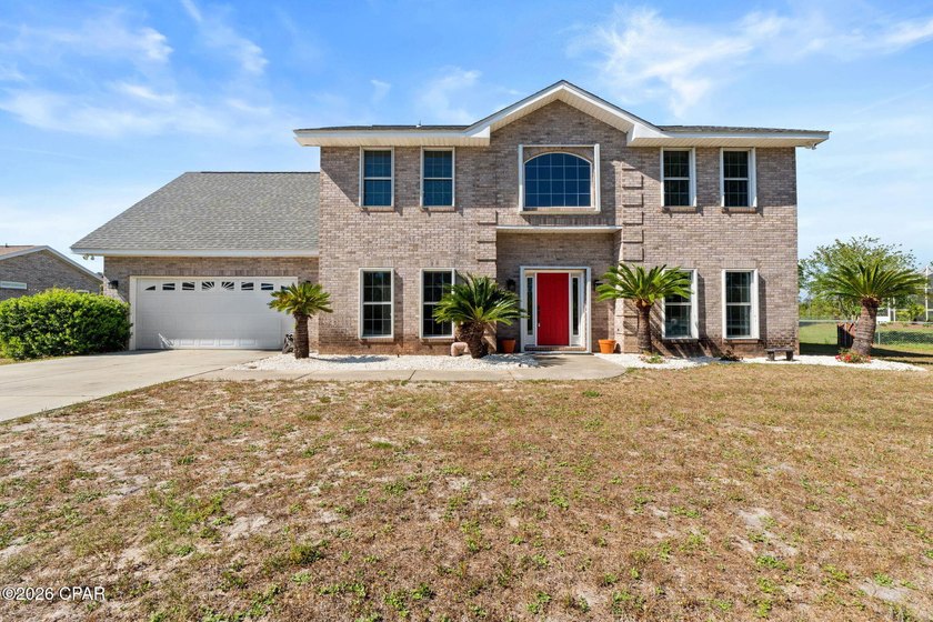 This custom-built, all-brick two-story home offering over 2,800 - Beach Home for sale in Panama City, Florida on Beachhouse.com