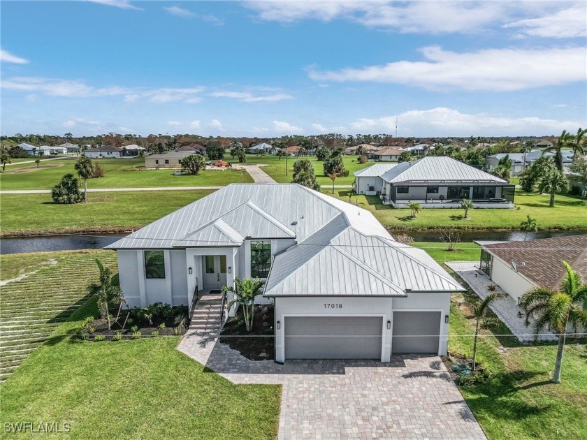 Welcome to 17018 Alpenhorn Court, a beautifully designed - Beach Home for sale in Punta Gorda, Florida on Beachhouse.com