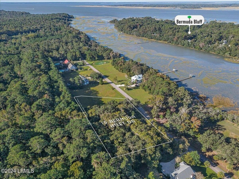 Welcome to this serene 1.54-acre lot in the gated Bermuda Inlet - Beach Lot for sale in Saint Helena Island, South Carolina on Beachhouse.com
