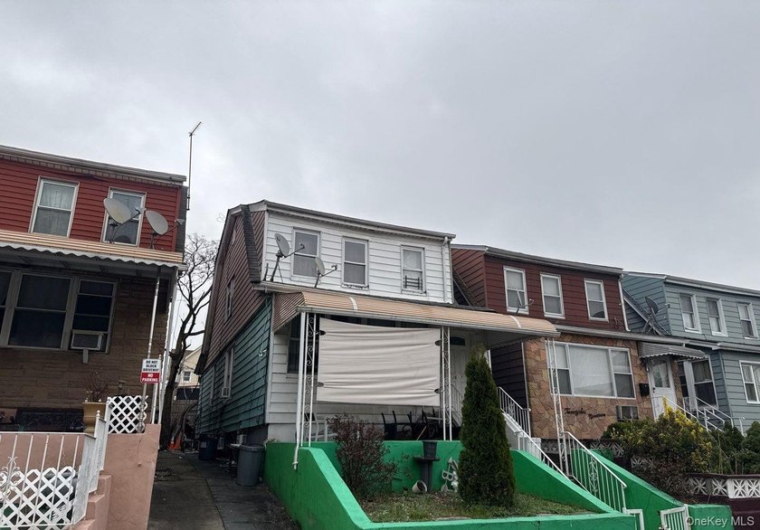 This Colonial Style Home Features 4 Bedrooms, 2 Full Baths and - Beach Home for sale in East Elmhurst, New York on Beachhouse.com