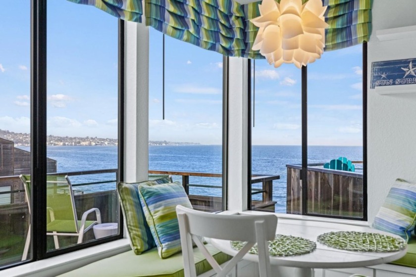 Panoramic ocean view with city lights at night will enthrall you - Beach Condo for sale in Monterey, California on Beachhouse.com