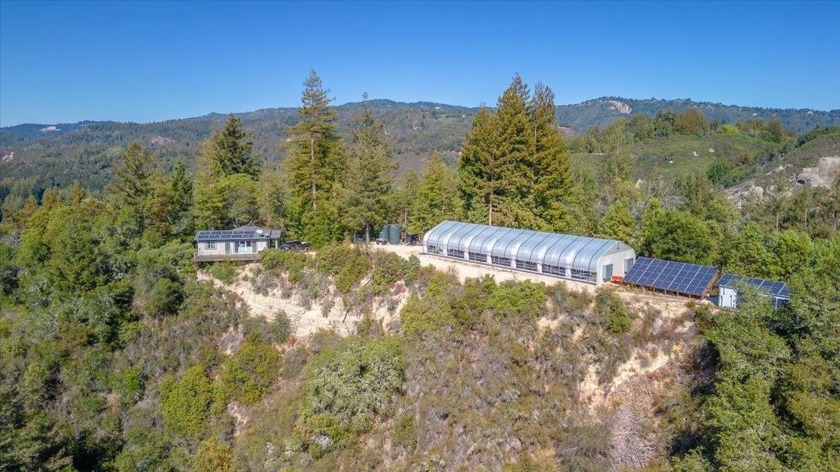 Nestled within the serene Santa Cruz Mountains, this enchanting - Beach Home for sale in Boulder Creek, California on Beachhouse.com