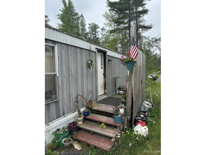 Excellent investment opportunity in the heart of Au Train. This - Beach Home for sale in Au Train, Michigan on Beachhouse.com