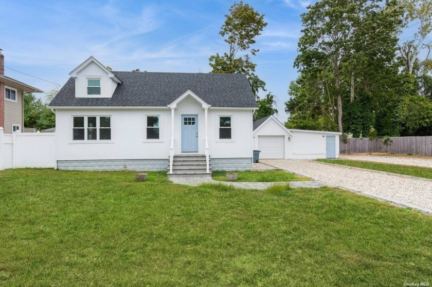 Welcome to this charming 2-bedroom Cape south of South Country - Beach Home for sale in East Patchogue, New York on Beachhouse.com