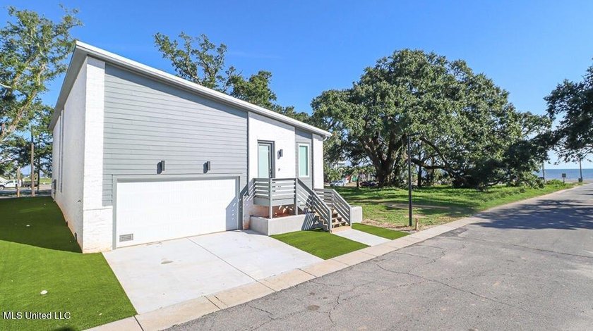 Being sold fully furnished!! Discover Effortless Beachside - Beach Home for sale in Gulfport, Mississippi on Beachhouse.com