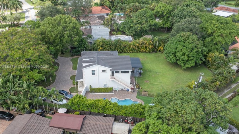 Beautifully renovated home sitting on a oversize lot in the - Beach Home for sale in Miami Springs, Florida on Beachhouse.com