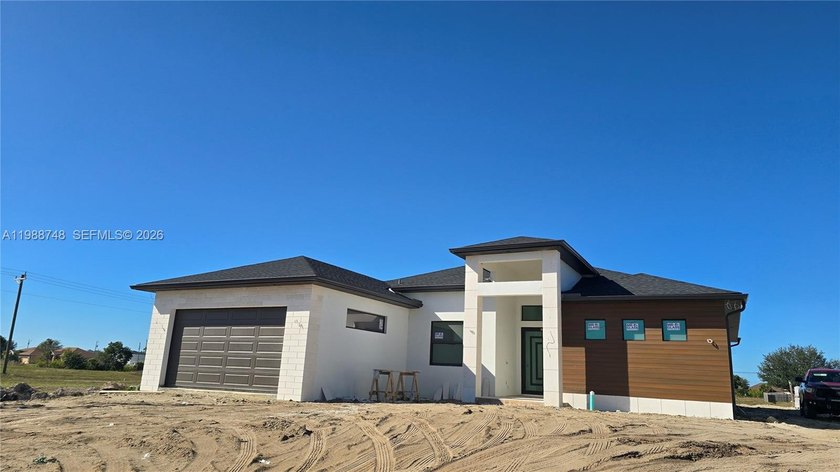 Welcome to this stunning four-bedroom, four-bath home in the - Beach Home for sale in Cape Coral, Florida on Beachhouse.com