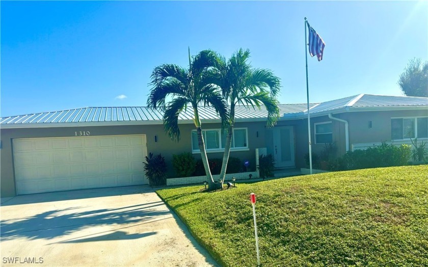 Belle Aire Lagoon Gulf access home features 3 bedrooms, 3 baths - Beach Home for sale in North Fort Myers, Florida on Beachhouse.com