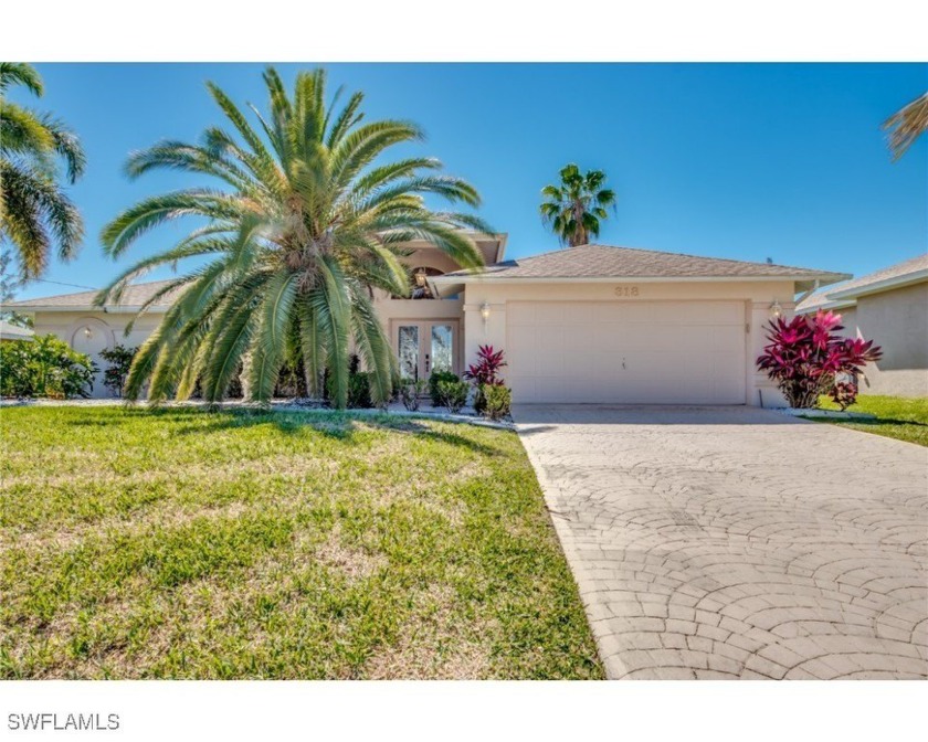 This stunning 3-bedroom, 2-bathroom home offers the perfect - Beach Home for sale in Cape Coral, Florida on Beachhouse.com