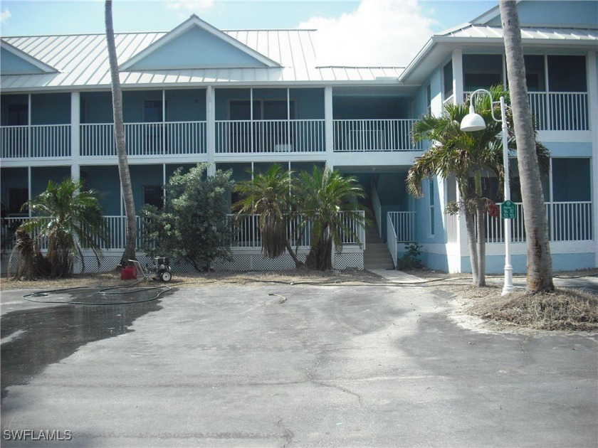 This two bedroom two bathroom ground floor unit in the popular - Beach Condo for sale in Sanibel, Florida on Beachhouse.com