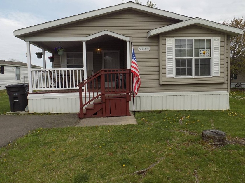 VERY NICE 3 BEDROOM 2 BATHROOM WITH A 12x13 COVERED PORCH - Beach Home for sale in Newport, Michigan on Beachhouse.com