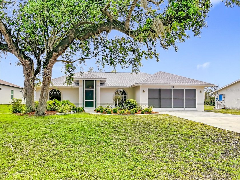 THIS HOME HAS IT ALL!! This charming 2-bedroom, 2-bath POOL home - Beach Home for sale in North Port, Florida on Beachhouse.com