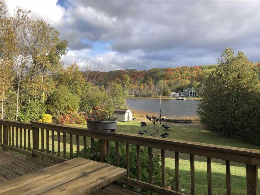 Set on 1.29 acres with 156 feet of waterfront on St Clair Lake - Beach Home for sale in Ellsworth, Michigan on Beachhouse.com